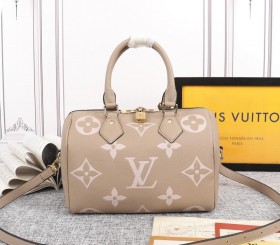 Louis Vuitton Bicolor Monogram Empreinte Leather Speedy Bandouliere 25 Handbag In Tourterelle Gray And Cream