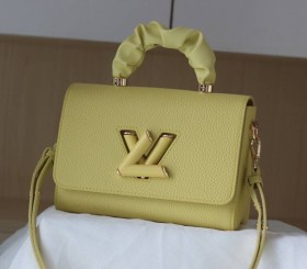 Louis Vuitton Taurillon Leather Twist MM Scrunchie Handle In Ginger Yellow