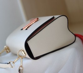 Louis Vuitton Epi Leather Twist MM Handbag In Cream With Gradient Strap