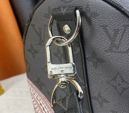 Louis Vuitton X YK Monogram Eclipse Reverse Keepall 45 Luggage In Pumpkin